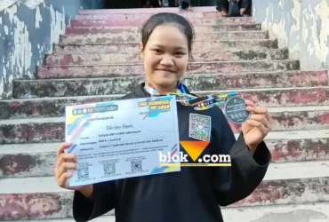 Adelia Dwi Cahya Anggraini, siswi SMP Negeri 1 Glagah, yang berhasil meraih Juara II pada ajang The Sunrise of Java Silat Championship 1, Minggu (31/5/2026) (foto: Blok-a.com/Kuryanto)