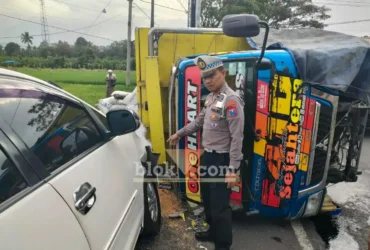 Piket Lantas Polsek Genteng, saat mendatangi TKP kecelakaan mobil pribadi kontra truk di Desa Dasri, Kecamatan Tegalsari, Selasa (28/07/2026) (blok-a.com/Kuryanto)