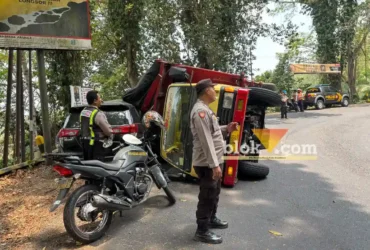 Kondisi truk Tronton saat terguling dan timpa mobil Toyota Innova di tikungan Patung Gandrung Mrawan, Rabu (30/09/2026) (foto: blok-a.com/Kuryanto)