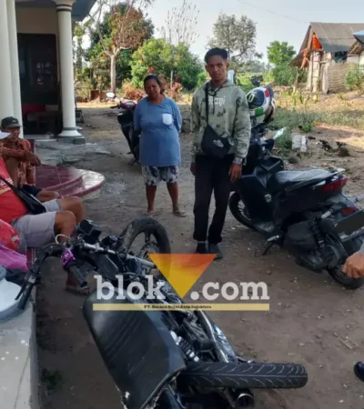 Piket Lantas Polsek Genteng usai mengevakuasi motor RX King tanpa Nopol usai bertabrakan dengan truk Fuso di Gambiran, Banyuwangi, Senin sore (21/09/2026)(foto: blok-a.com/Kuryanto)